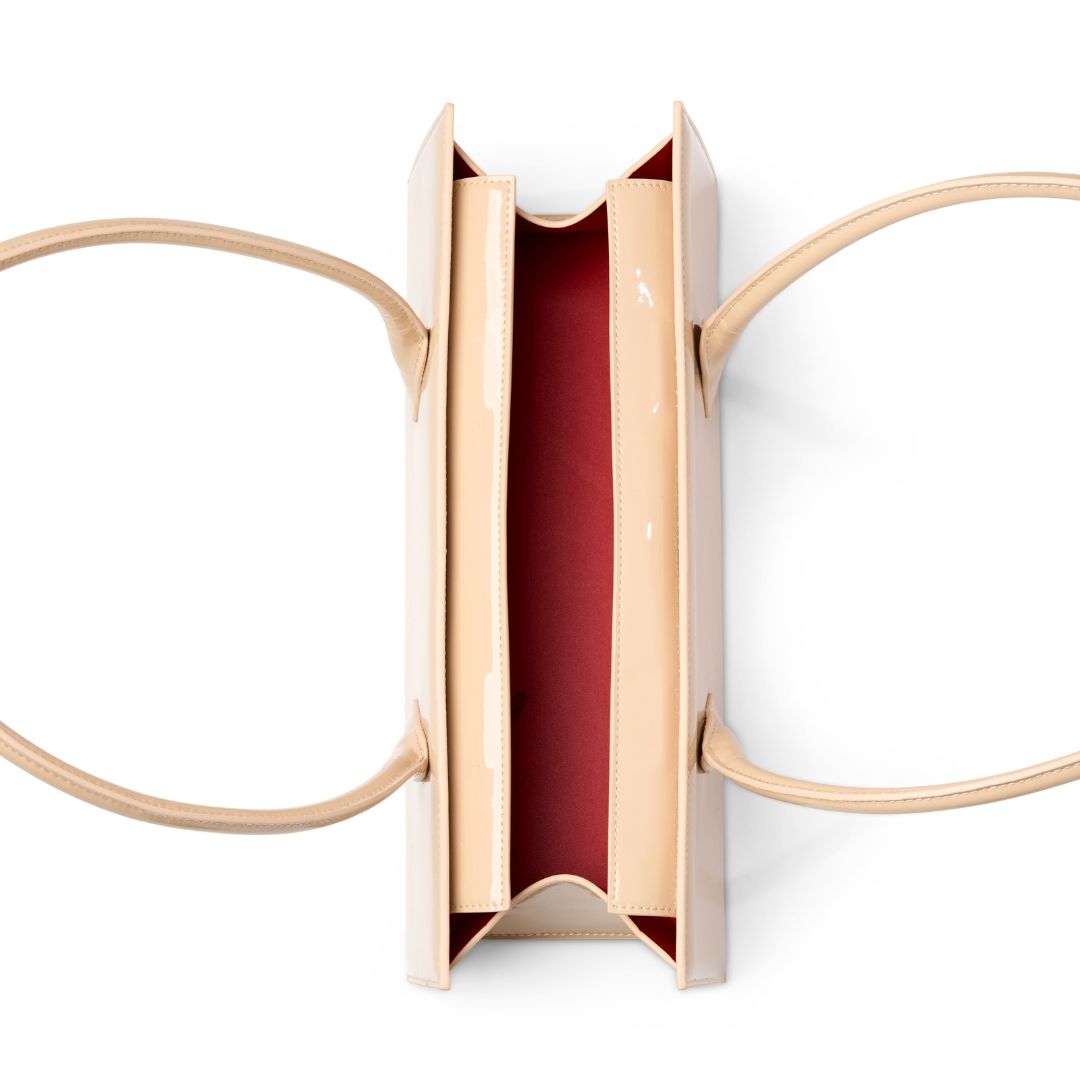 the red interior nude patent handbag #colour_nude - patent