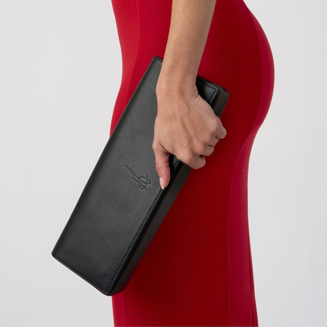 side view of the black Aurora Bella clutch bag #colour_black